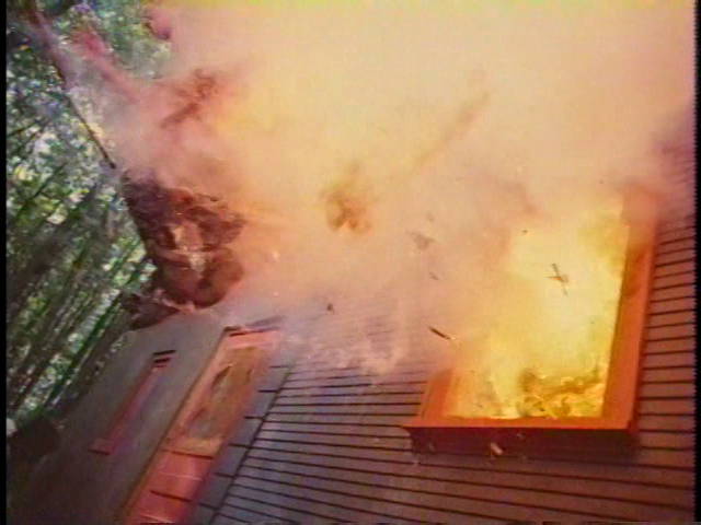 A man tries to jump from an exploding building and mostly succeeds.